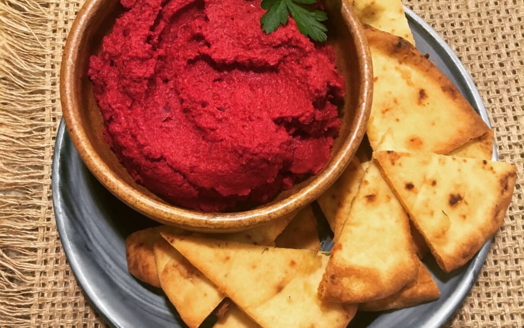 Signature hummus with baked pita wedges
